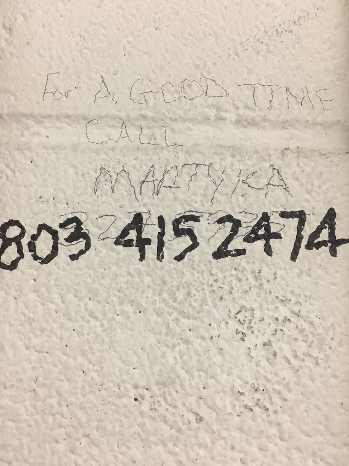 Martyka's phone number on the wall